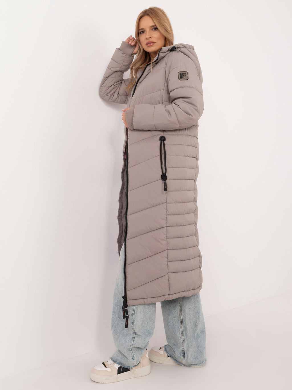 Lange Gewatteerde Winterjas met Capuchon – Donkerbeige