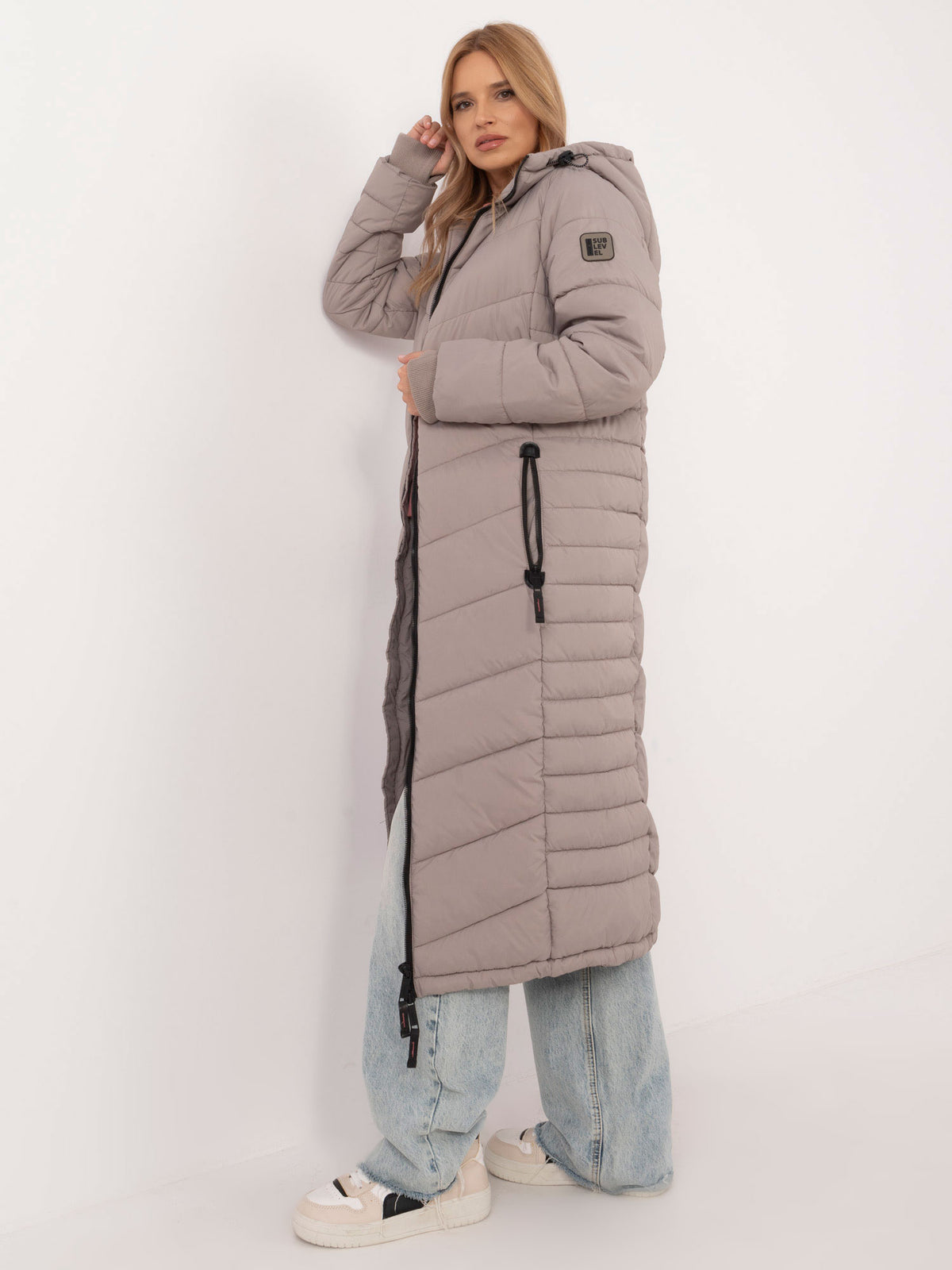 Lange Gewatteerde Winterjas met Capuchon – Donkerbeige