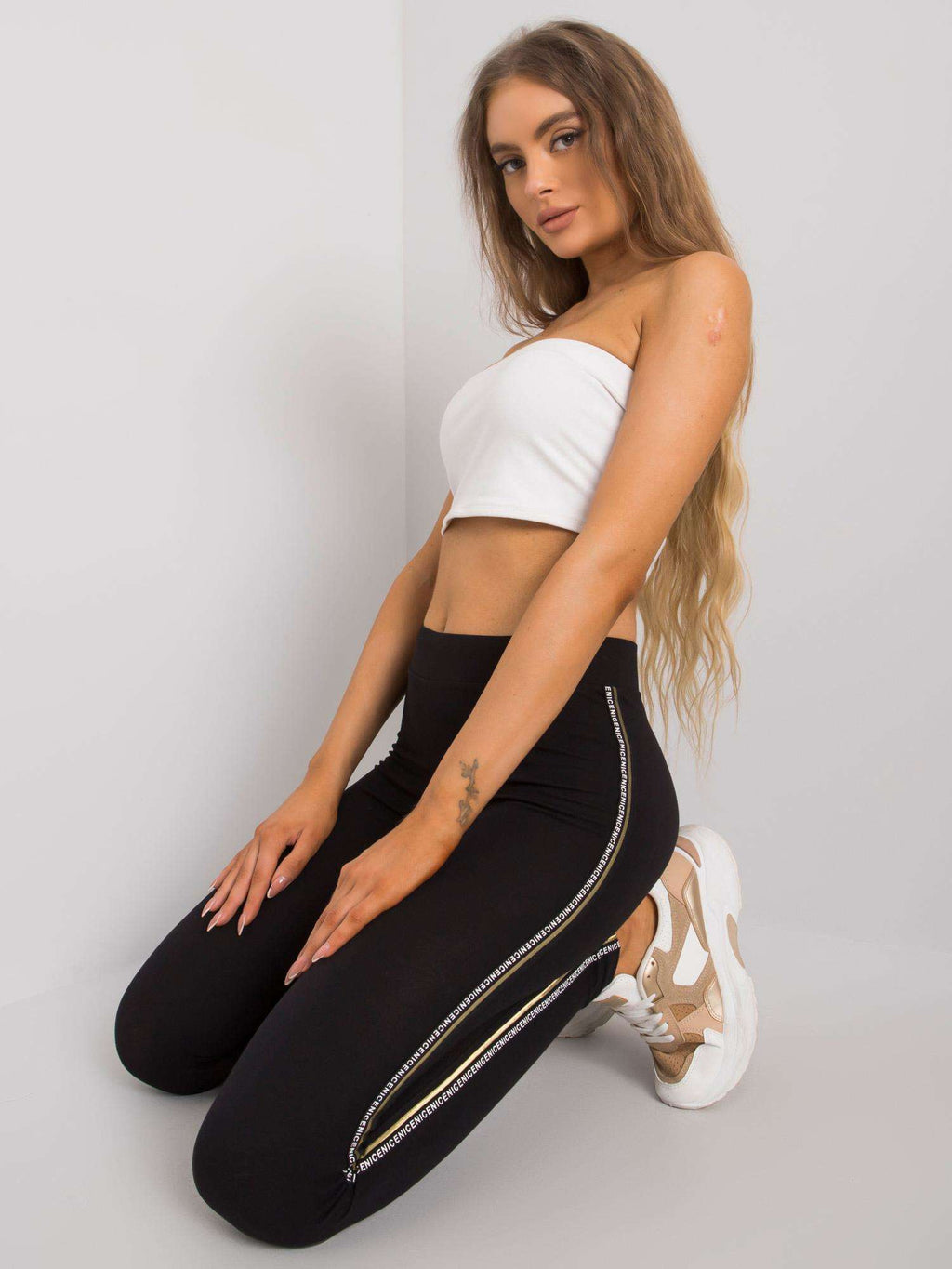 Legging met Gouden Strepen – Zwart/Goud