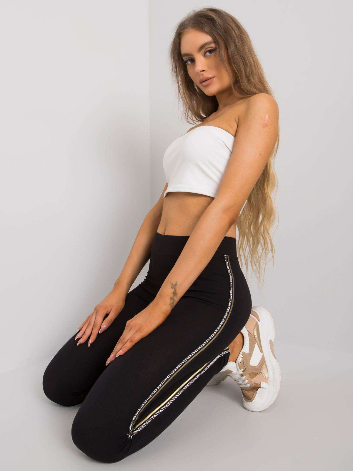 Legging met Gouden Strepen – Zwart/Goud